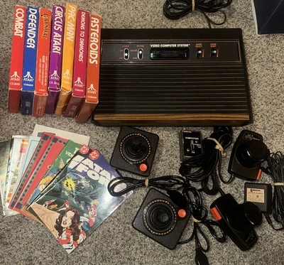 Atari 2600 Console Bundle Joysticks Paddles 7 Games Manuals and More - Image 1 of 4