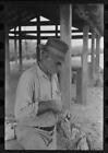 Oyster shipper making out tags,bags of oysters,Olga,Louisiana,LA,FSA,1938,2