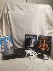 Sylvania Portable DVD Player with Three DVD's tested it works cleaned DVD's - Picture 1 of 2