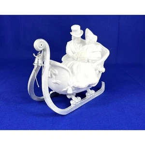 Estatuilla de porcelana de porcelana de silueta de invierno vintage Department 56 paseo en trineo. - Imagen 1 de 4