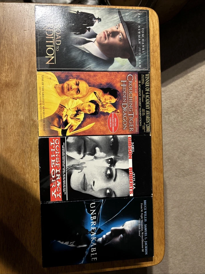 Lot Of 4 VHS Road To Perdition Unbreakable Conspiracy Theory Crouching Tiger… Foto 1 de 4