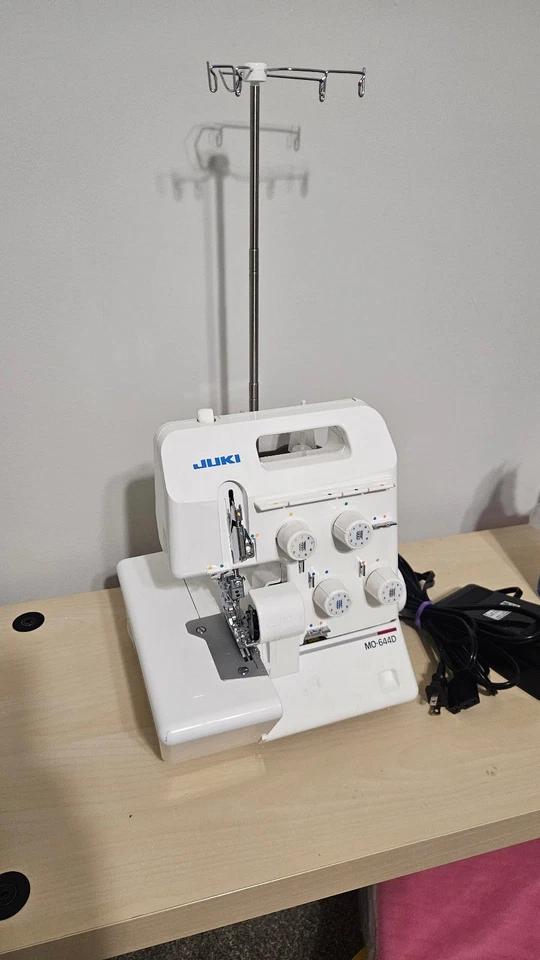 Juki MO-644D 3/4-Thread Overlock Serger Sewing Machine w Accessories and Thread - Image 1 of 4