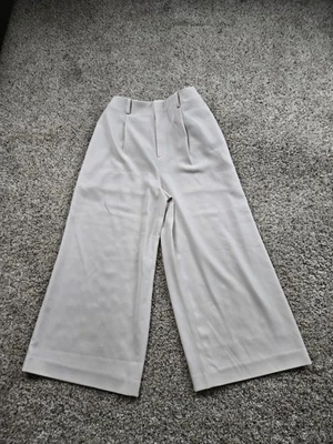 Pantalones Uniqlo Mujer Pequeños Beige Pierna Ancha Tiro Alto Vestido Pantalón Elástico Foto 1 de 4