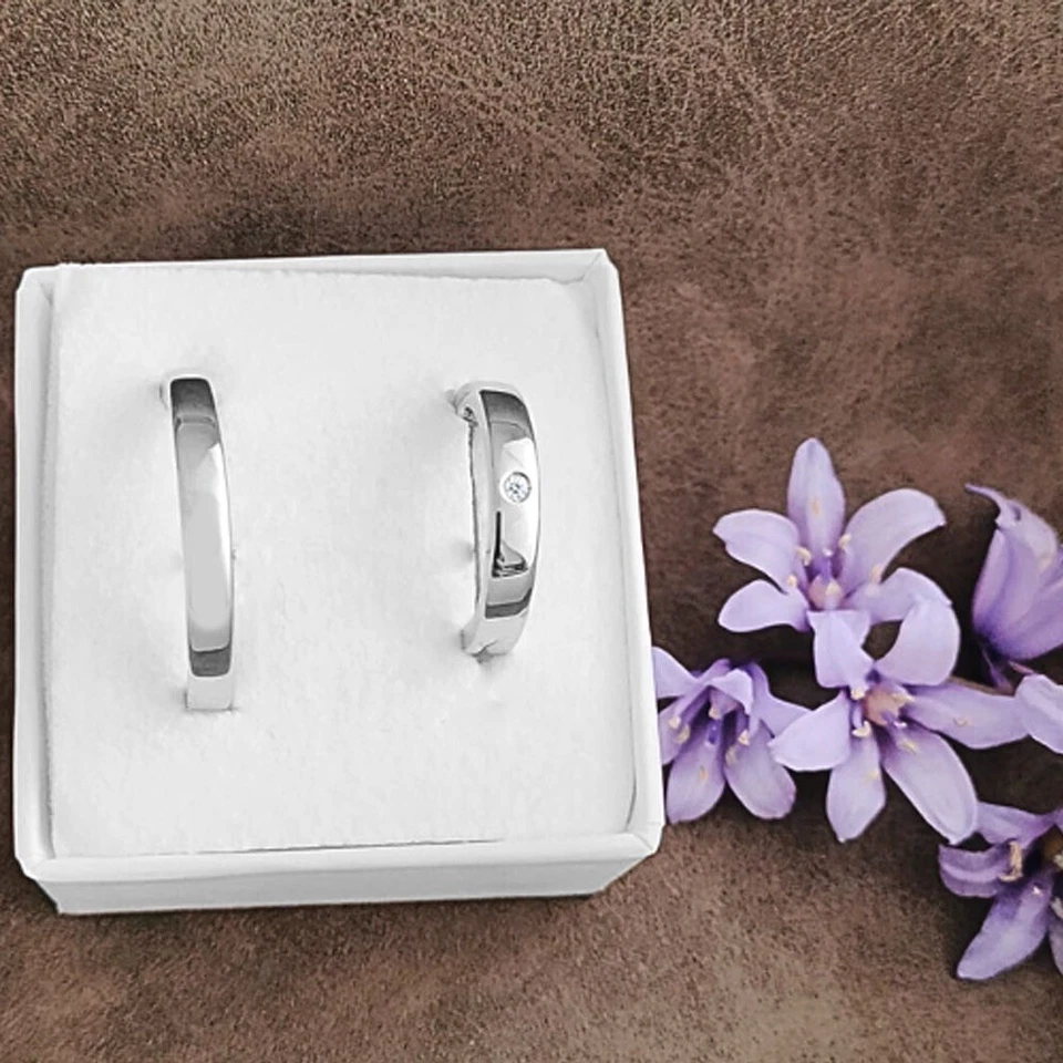 Coppia di fedi - fedine in argento 925 con diamante bianco. Fedine anniversario - Immagine 1 di 2