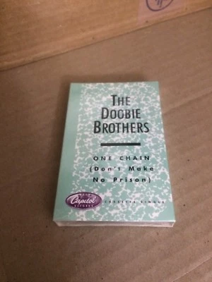 DOOBIE BROTHERS ONE CHAIN DON'T MAKE NO PRISON  FACTORY SEALED CASSETTE C14 - Image 1 of 4