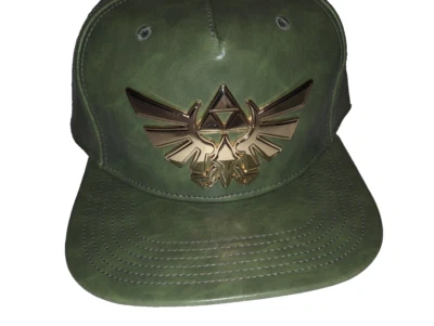 Gorra Zelda de metal dorado con cierre a presión como gorra de béisbol verde de cuero Foto 1 de 4
