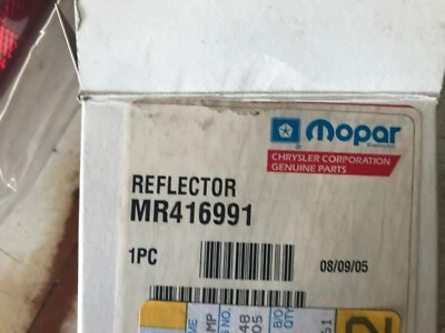 Reflector/fascia de faros superior izquierdo Dodge Stratus 2001-2002 OEM Mopar MR416991 Foto 1 de 3