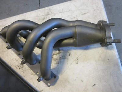Cabezal de escape de fábrica BMW M42 318i // ¡Usado XLNT! Foto 1 de 2