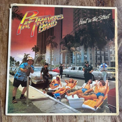 PAT TRAVERS BAND - HEAT IN THE STREET  VG+/EX- VINYL LP / UK FIRST/PRINTED INNER - Image 1 of 4