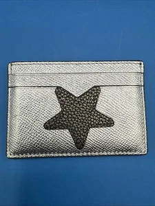 Coach Astuccio Porta Carte d'identità Donna Slim Argento Metallizzato con Stella Grande - Foto 1 di 8
