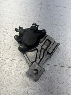 Suzuki-2003-2008-SV650 Rear Brake Caliper Bracket Mount OEM - Image 1 of 4