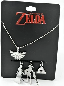 NINTENDO ZELDA UND GLIEDERKETTE MIT CHARMS - NEU - Bild 1 von 7