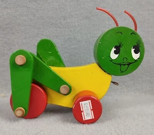 GRILLO IN LEGNO CAVALLETTA NEW VINTAGE DEADSTOCK TOY TRAINABILE CON RUOTE BERO - Foto 1 di 3