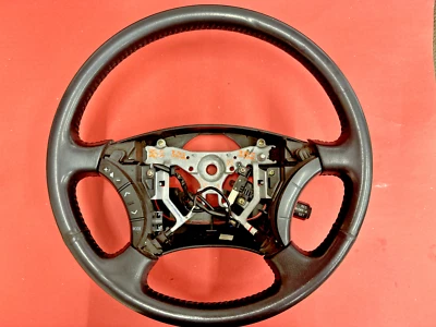 Toyota 4runner 2003-2009 volante de cuero negro crucero y radio usado ¡OEM! Foto 1 de 4