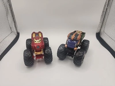 HOT WHEELS MONSTER JAM MONSTER TRUCKS  IRON MAN & THANOS  - image 1 of 4