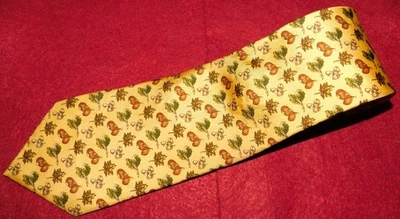 BURBERRYS MADE IN ENGLAND YELLOW/BROWN/GREEN LEAF MOTIF TIE - DESIGNER TIES. - Image 1 of 3
