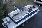 Triple tube-New 26 ft pontoon boat with 200 hp and trailer