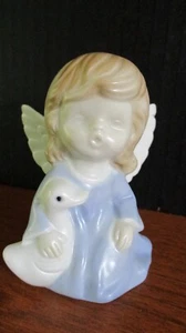 FIGURINA porcellana vintage 1983 BAMBINA ANGELO CHE TIENE UN'ANATRA o OCA - Foto 1 di 3