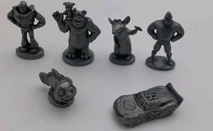 Gettoni da gioco in peltro Monopoly Disney Pixar Edition tutti e 6 pezzi di ricambio  - Foto 1 di 2