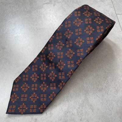 Corbata de seda Gucci con patrón integral azul marino naranja Italia usada Foto 1 de 3