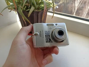 🔥Cámara compacta digital Nikon CoolPix L10 plateada 5,0 MP🔥Juego completo funcionando🔥 - Imagen 1 de 7