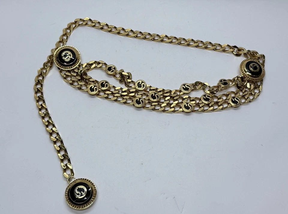 St. John Gold Triple Chain Belt Exaggerated Abstract Initials Logo 48” - Image 1 of 4