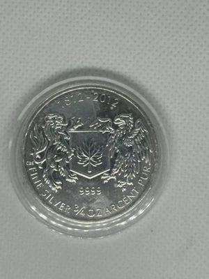2012 CANADA $1 SILVER WAR OF 1812 COAT OF ARMS ANNIVERSARY 3/4 OZ SILVER COIN - Image 1 of 2