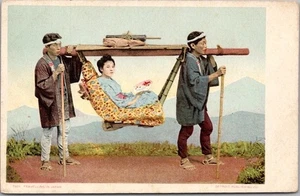 c1900s "TRAVELLING IN JAPAN" Postcard - Woman in Litter / Detroit Pub. #7801 - Picture 1 of 2