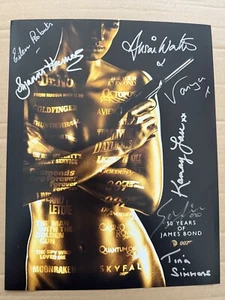 007 James Bond 14x11 photo signed by SEVEN Bond movie actresses - Picture 1 of 1
