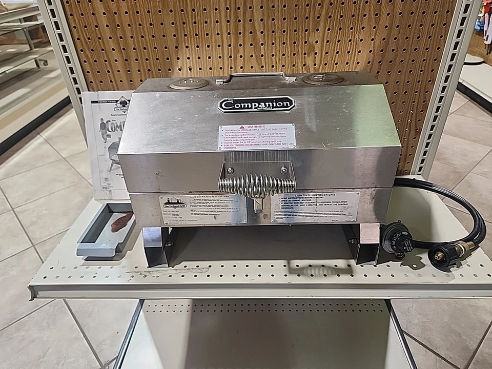 Difícil de encontrar Holland Companion portátil de acero inoxidable a gas barbacoa parrilla patas plegables  Foto 1 de 4