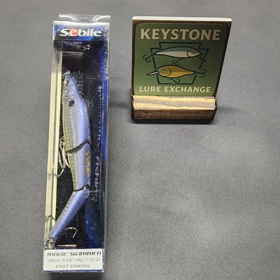 Pia rápida Sebile Saltwater Magic Swimmer 145! 5-3/4 pol. Costas azuis/barriga amarela. - Imagem 1 de 4