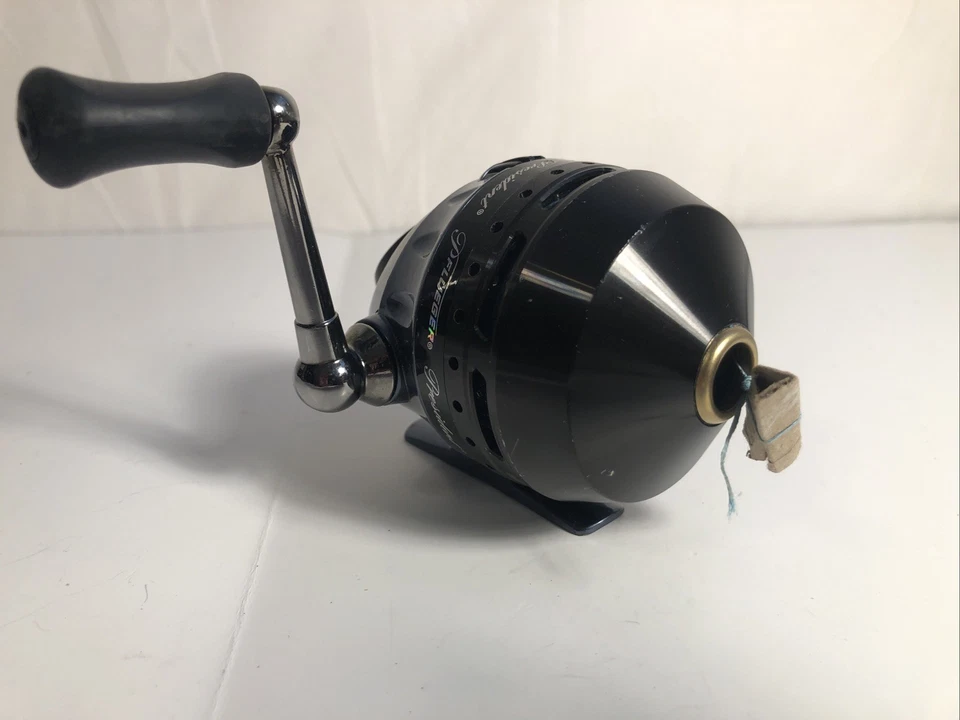 Carrete de pesca Pflueger President Spincast, tamaño 10, para diestros Foto 1 de 4