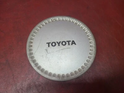 Tapacubos central Toyota Corolla 1983-1999 y otros 69168A 69164 Foto 1 de 3