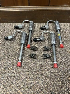 New Set Of 4 Reman CAT Caterpillar Diesel Fuel Injectors - Picture 1 of 8