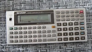 SHARP PC-1401 BASIC Programmable Scientific Pocket Calculator - Picture 1 of 7