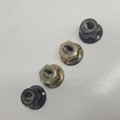 Juego de 4 tuercas de montaje de consola central de piso Ford F-150 1997-2001 OEM Foto 1 de 4