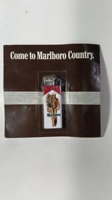 New NOS 1985 Vintage Cowboy  Marlboro Man Slim Cigarette Lighter - Image 1 of 4