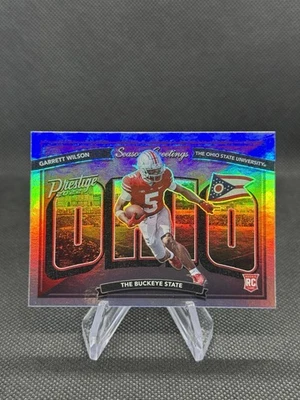 2022 Panini Prestige - Seasons Greetings Garrett Wilson #SG-7 (RC) Silver Foil - Image 1 of 2