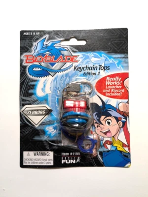 TOTALMENTE NUEVO Llavero Beyblade Tops De Colección Seaborg 2002 Diversión Básica Nuevo en Paquete #1199 Foto 1 de 4