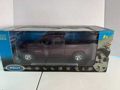 Camión de carga corta Welly Dodge 2002 Ram 1500 Quad escala 1/18 Foto 1 de 4
