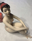 Bathing Beauty Figurine in Strapless Floral Suite and Red Hair Bow with Knees Up