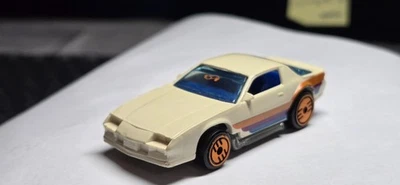 CAMARO Z/28 SUELTO HOT WHEELS 80 EN MARFIL CON RUEDAS ULTRAHOT NARANJA AZUL INTER Foto 1 de 4