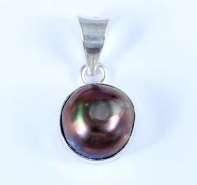 Colgante de piedras preciosas de perlas negras redondas naturales de Tahití de 6,95 quilates del Mar del Sur para hombre Foto 1 de 4