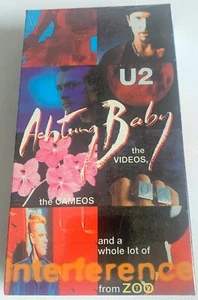 U2-ACHUNNG BABY:THE VIDEOS,THE CAMEOS,AND A WHOLE LOT OF INTERFERENCE-VHS TAPE F - Imagen 1 de 2