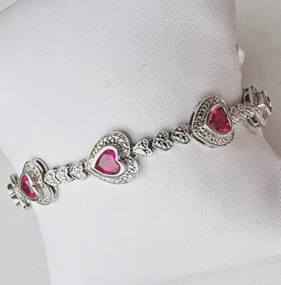 925 STERLING SILVER LAB GROWN 5x5 mm.  HEART PINK RUBY BRACELET  15g.   7.25" - Image 1 of 4