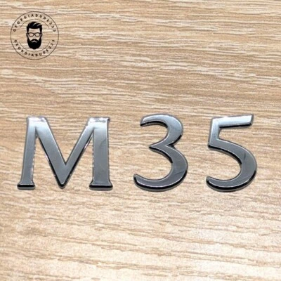 Infiniti M35 2006-2010 emblema letra "M35" cromo logotipo insignia OEM maletero trasero Foto 1 de 4
