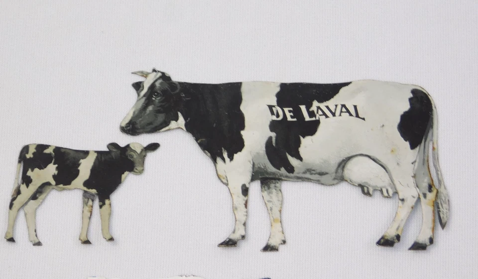 Антикварный рекламный набор De Laval сепаратор крема олово голштин корова и теленок - Изображение 1 из 4