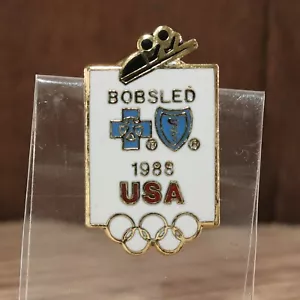 1988 USA Bobsled Team VTG Lapel Pin Blue Cross Sponsor Calgary Winter Olympics - Picture 1 of 5