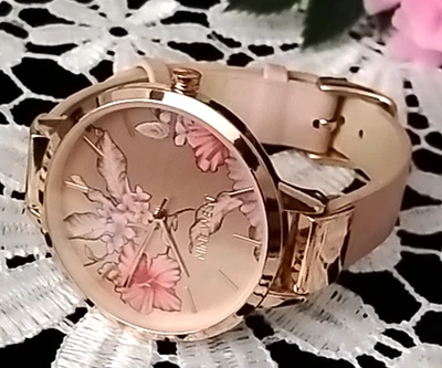 Reloj para mujer Nine West tono oro rosa correa de cuero esfera floral nuevo con etiquetas/2044 funcionando Foto 1 de 4