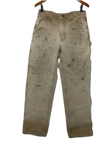 Pantalones de mezclilla para hombre Carhartt 32x34 caqui USADOS EN MANCHADOS pantalones de trabajo carpintero - Imagen 1 de 10